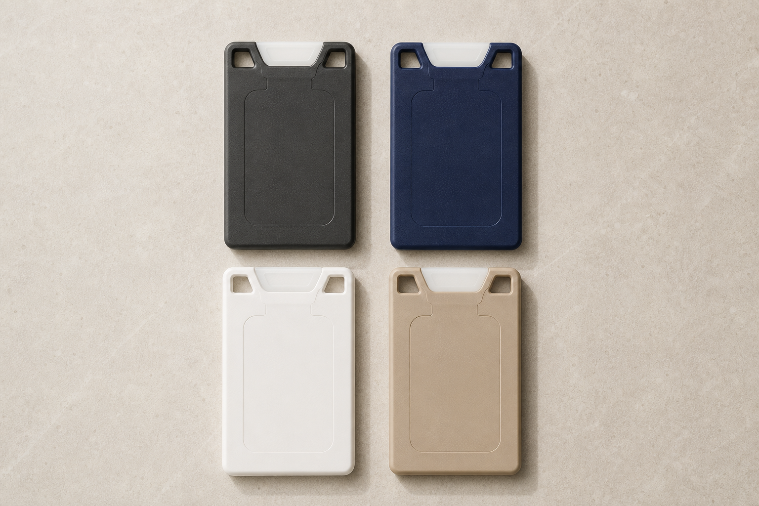 Four upright VORO lip balm colorways on a warm stone surface.