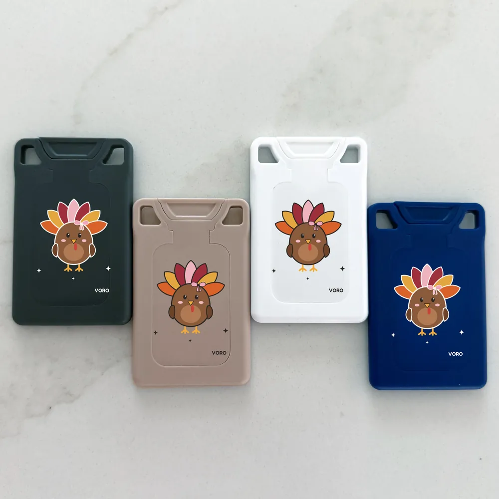 The Little Turkey design set: four VORO cards printed with a round turkey wearing a pink bow.