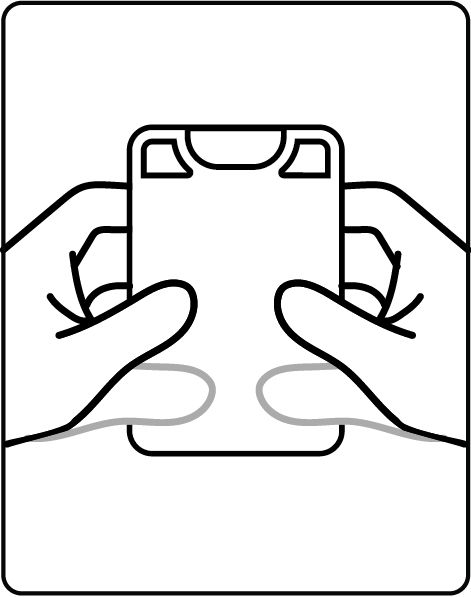 Squeezing the VORO card to release the applicator.
